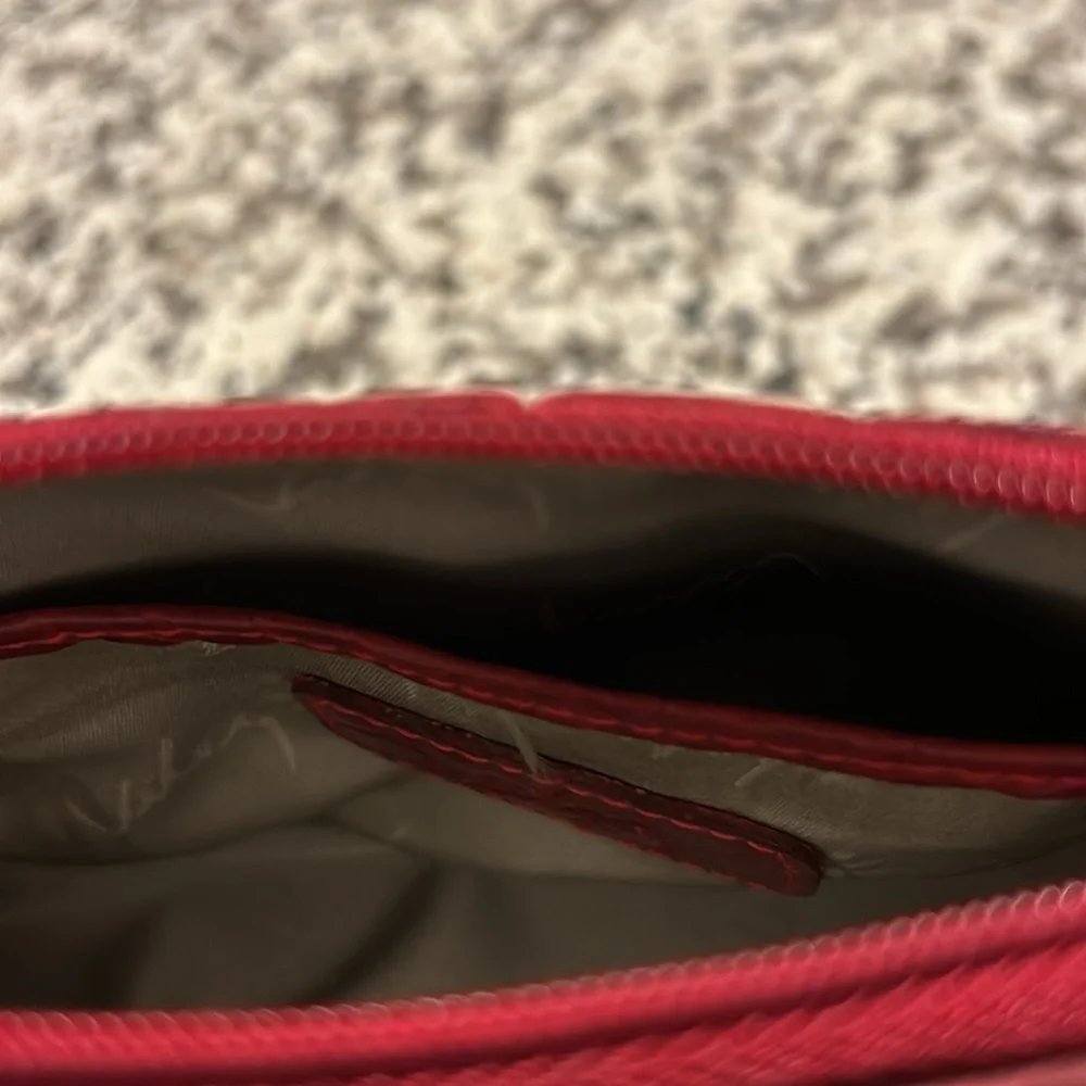 Velez Red Leather(?) Zippered Make-Up Bag w/Silver Lining. 8” W x 4 1/2” H. Good
